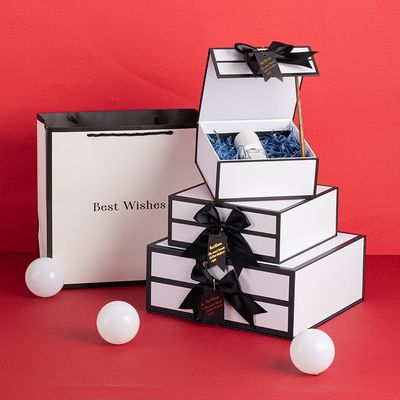 De stijve Witte Magnetische Dozen van de Kartongift met Zwart Rim And Ribbon Bow